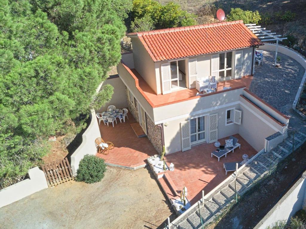 an overhead view of a house with a patio at Villa Ginanneschi - Le Pitte in Capoliveri