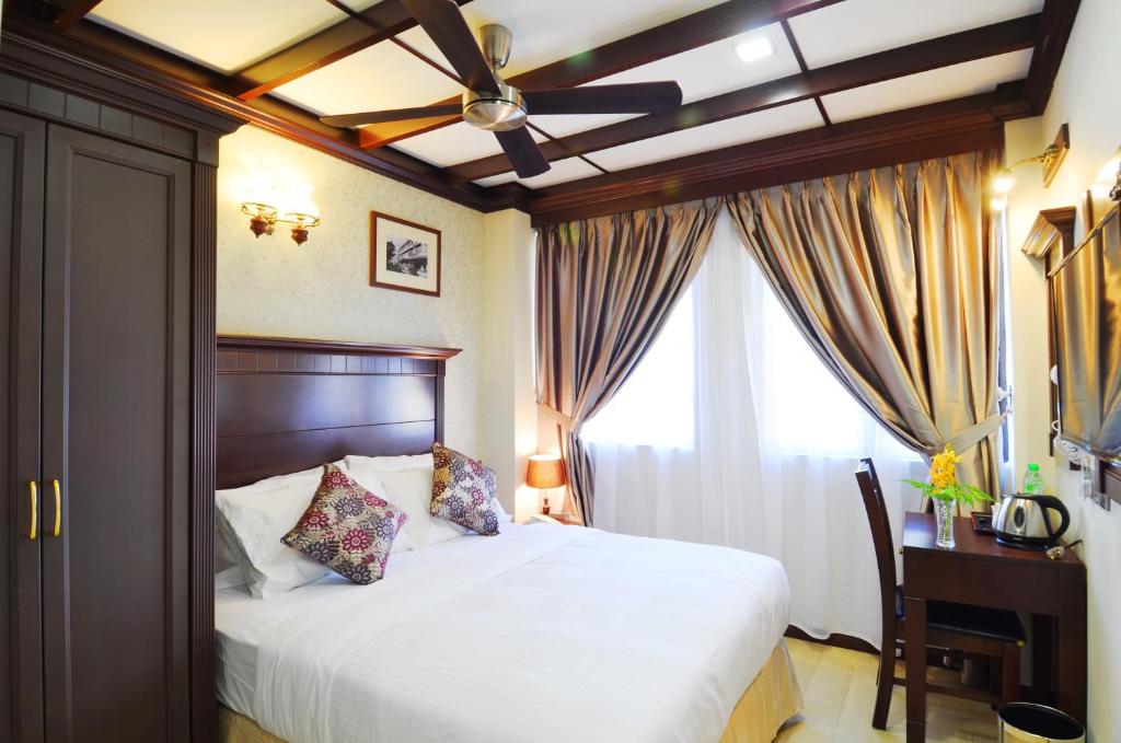 Postel nebo postele na pokoji v ubytování Hotel Kooler Inn