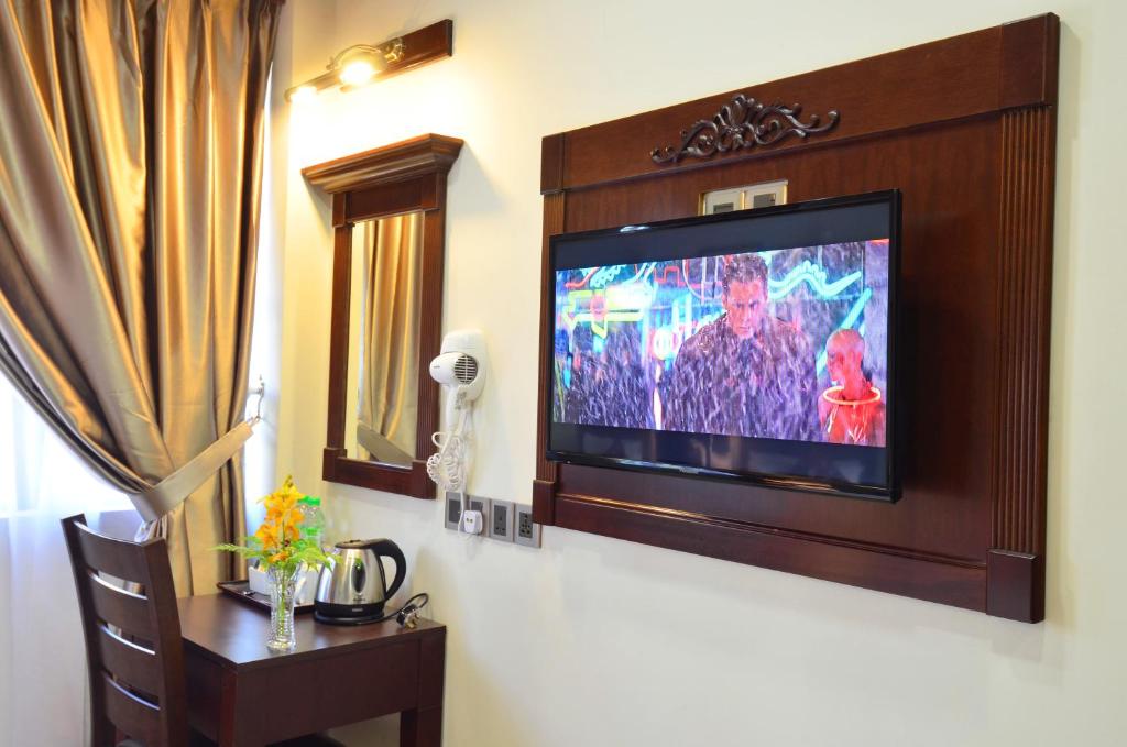 TV a/nebo společenská místnost v ubytování Hotel Kooler Inn