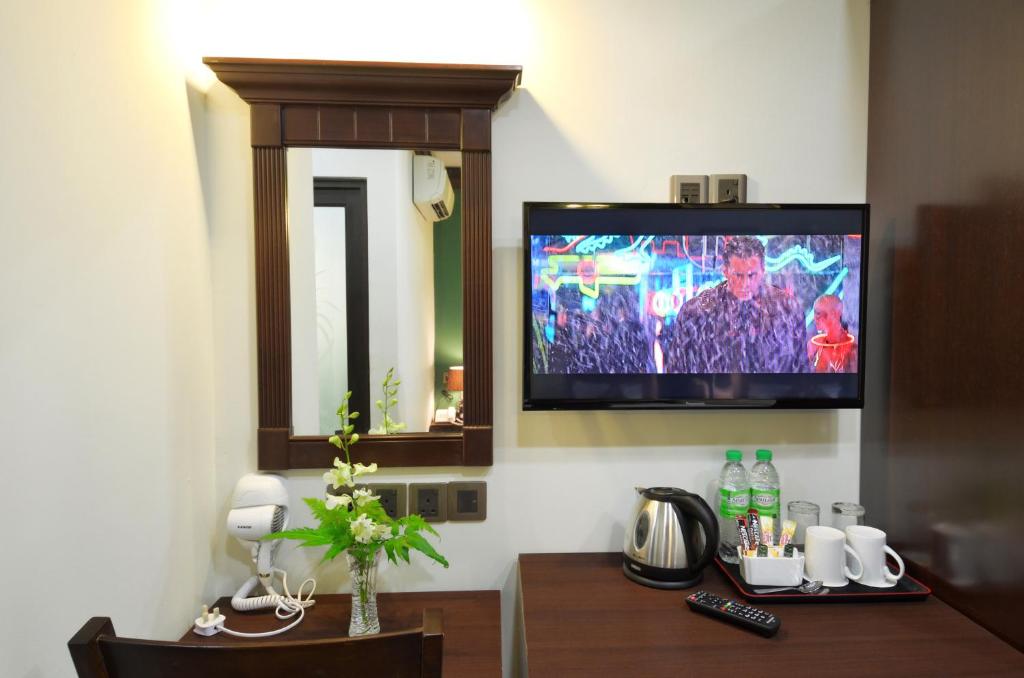 TV a/nebo společenská místnost v ubytování Hotel Kooler Inn