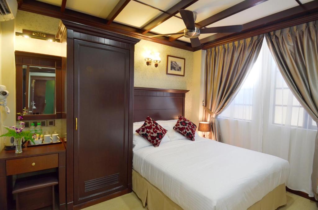 Postel nebo postele na pokoji v ubytování Hotel Kooler Inn