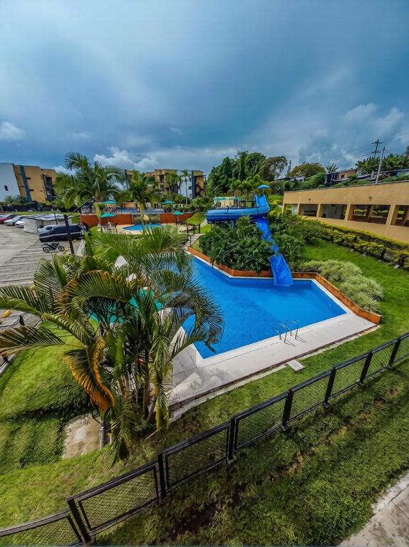 an overhead view of a swimming pool at a resort at Apartamento turistico diana in La Tebaida