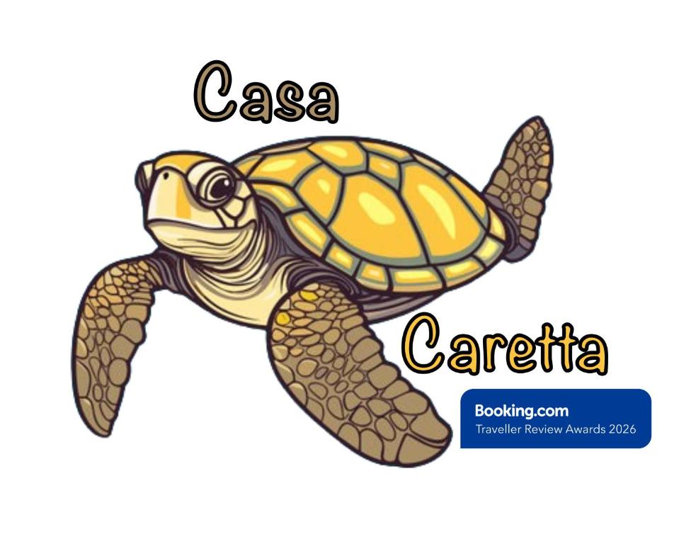 Eine Schildkröte kriecht auf einem weißen Hintergrund in der Unterkunft Casa Caretta in Policoro