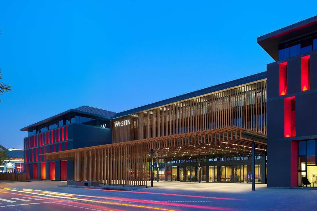 a large building with red and brown at The Westin Xi'an in Xi'an