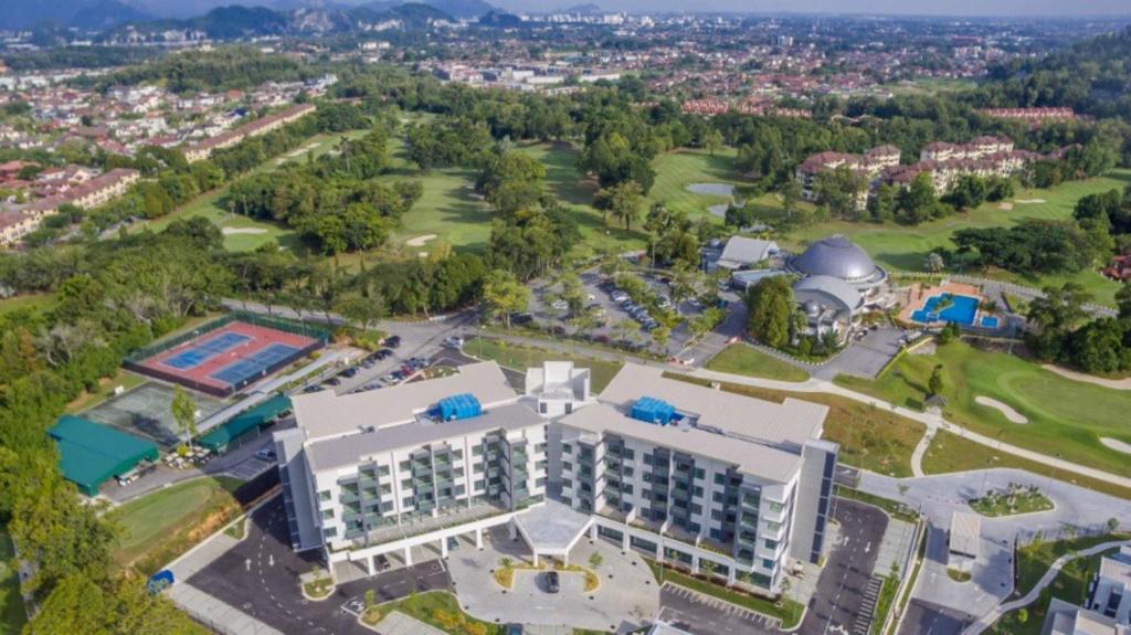 an aerial view of a large building with a pool at Meru Suites at Meru Valley Resort in Ipoh