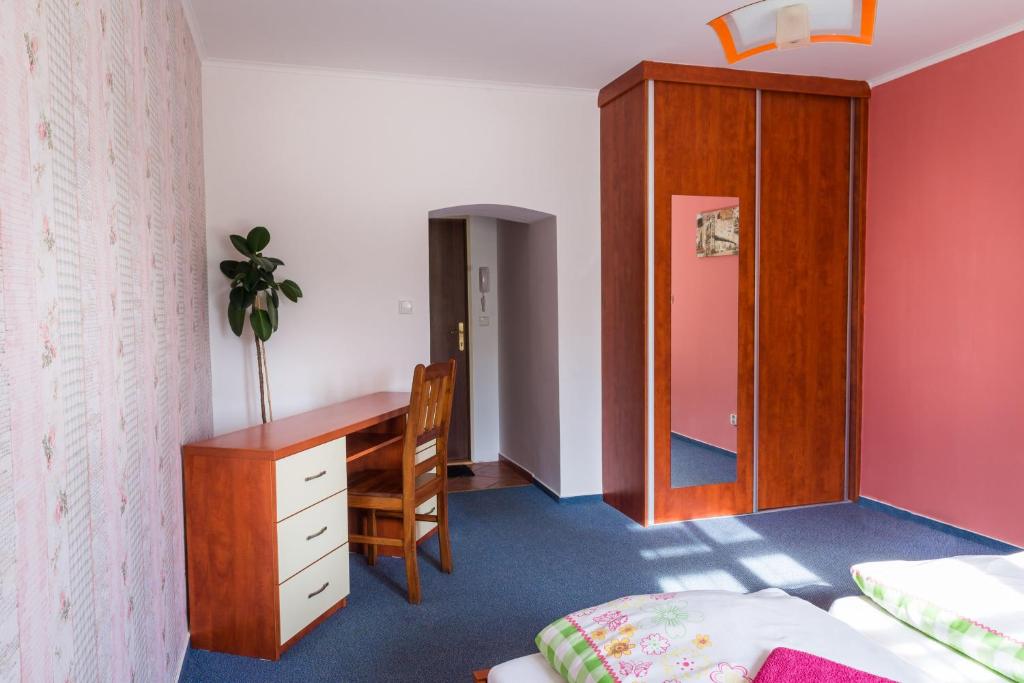 Postel nebo postele na pokoji v ubytování Penzion Na Kopečku
