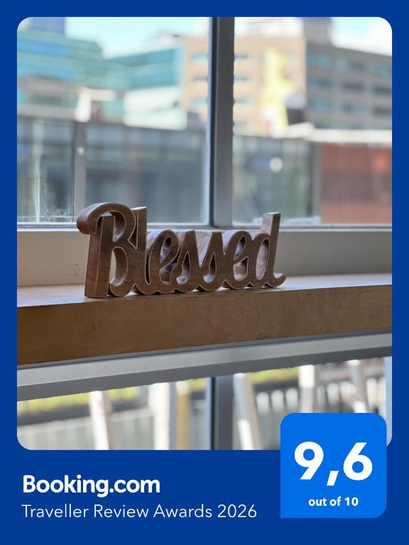 a wooden sign that readsreal sitting on a window sill at New York Style Loft in Downtown Vancouver in Vancouver
