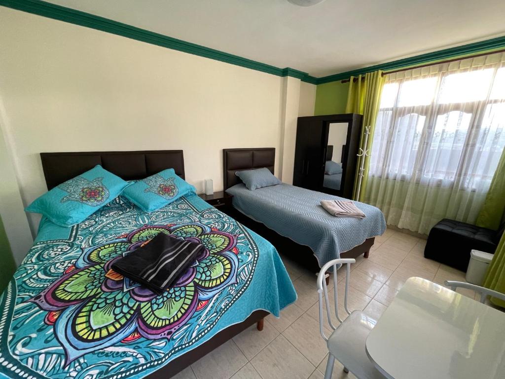Llit o llits en una habitació de Casa Danna