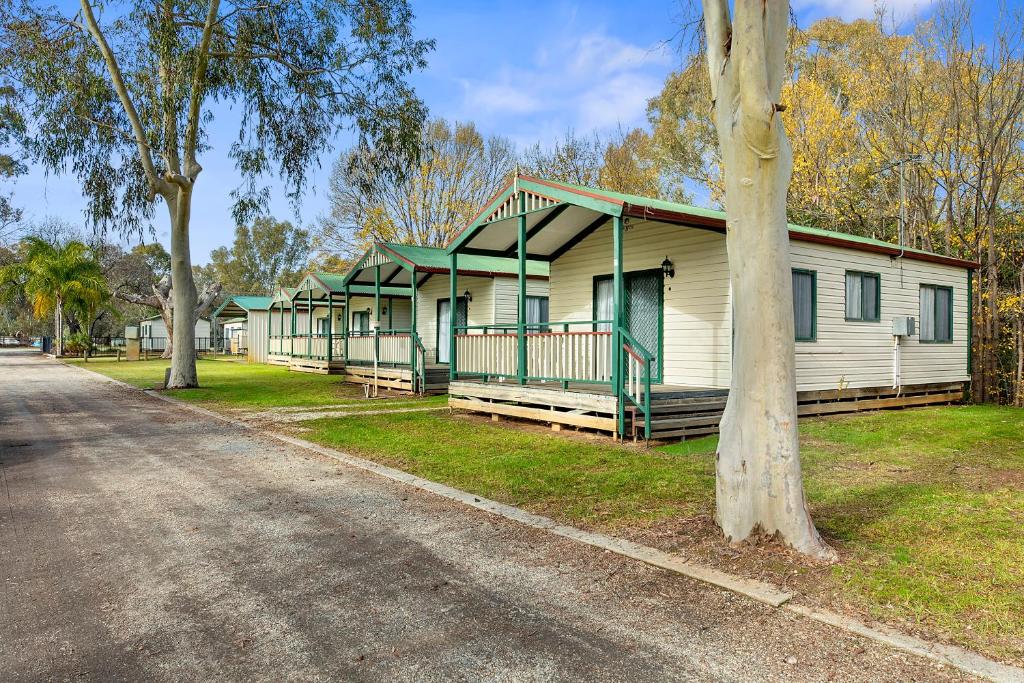 a row of houses on the side of a road at Howlong Caravan Park in Howlong
