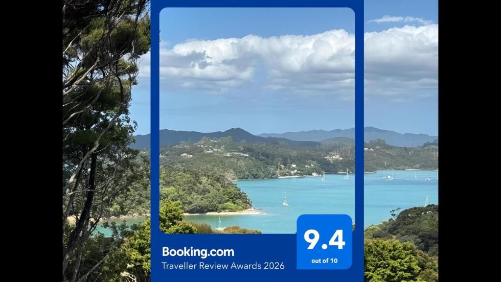 a screenshot of a cell phone with a picture of a lake at Paihia Lighthouse in Paihia