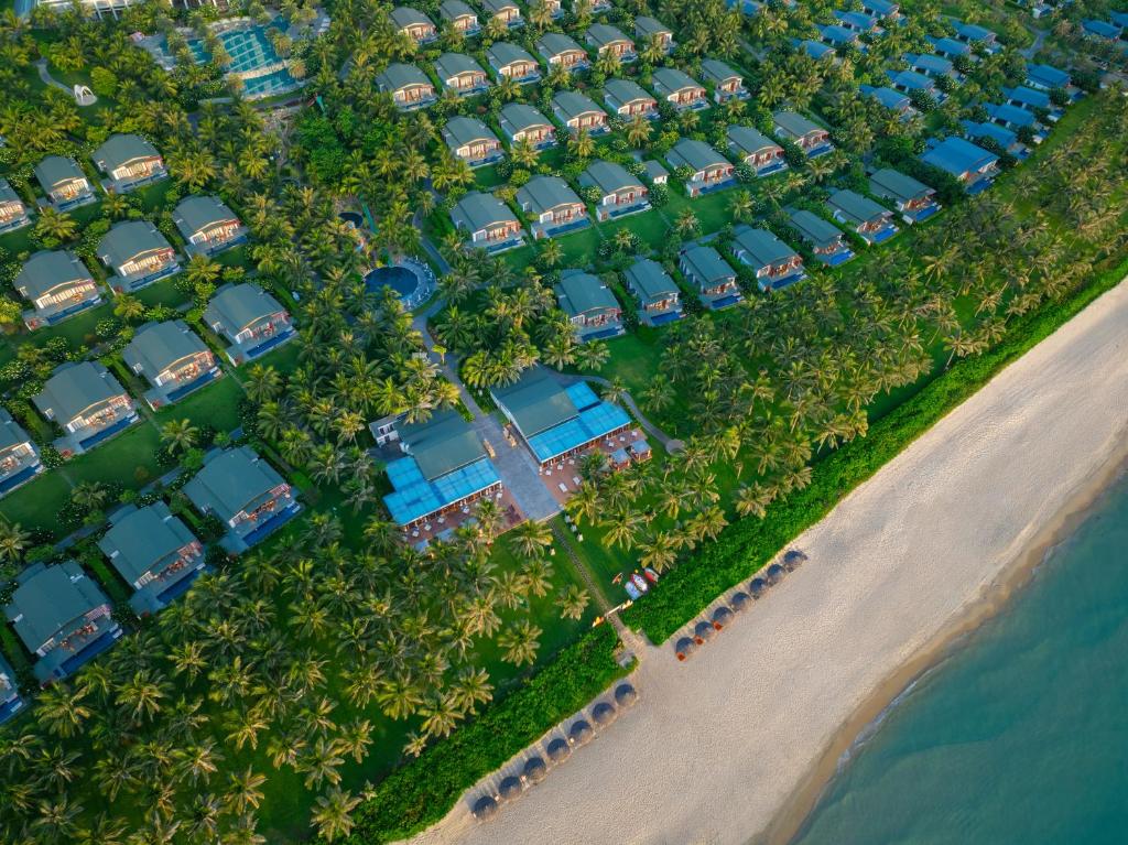 an aerial view of a resort near the beach at Mövenpick Resort Cam Ranh in Cam Ranh
