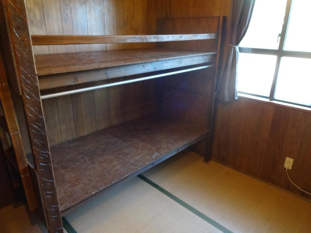 Palanda nebo palandy na pokoji v ubytování Hotel Hibiscus