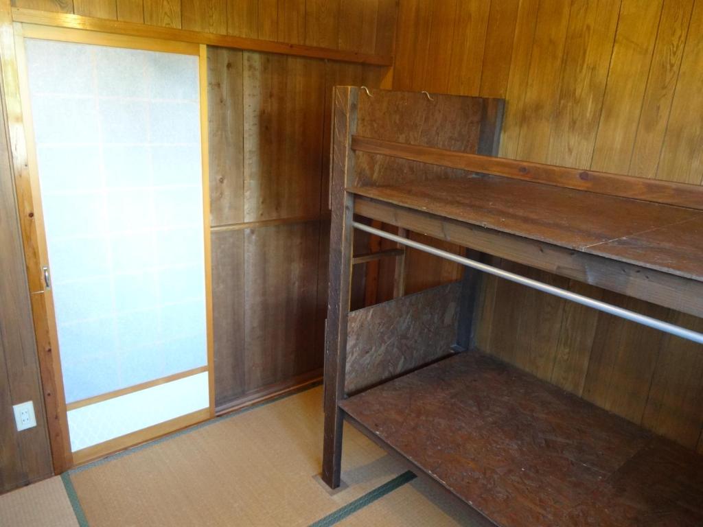 Palanda nebo palandy na pokoji v ubytování Hotel Hibiscus