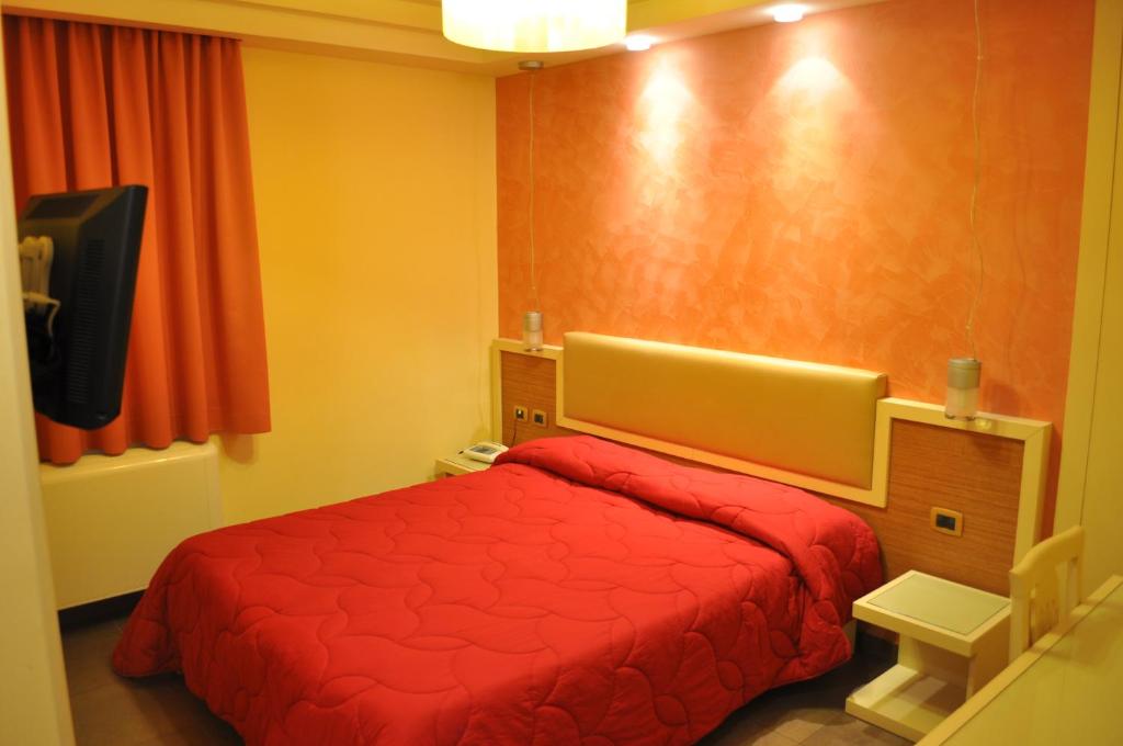 Postel nebo postele na pokoji v ubytování Aerhotel Phelipe