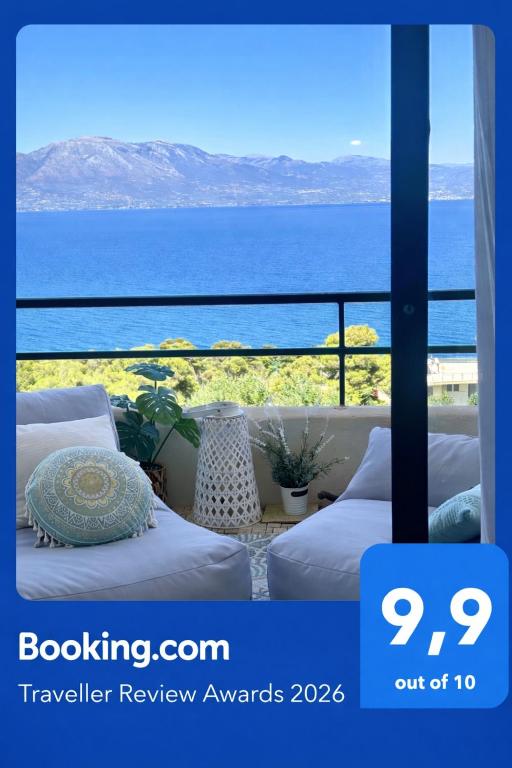 a hotel room with a view of the ocean at SeaTerra Boutique suite in Kalamos