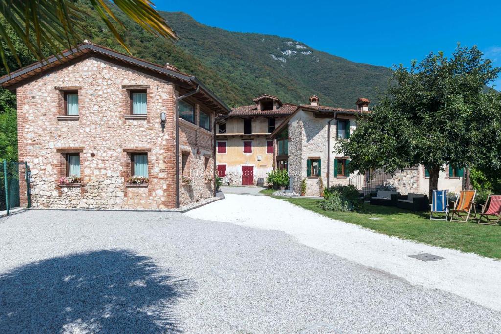 an empty driveway in front of a building at B&B Mulino di Campese in Campese