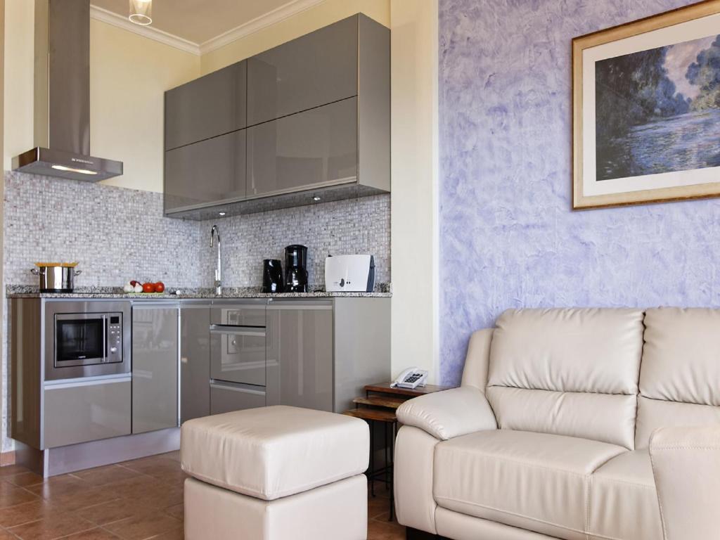 Kuchyň nebo kuchyňský kout v ubytování Idyll Suites - Adults Only