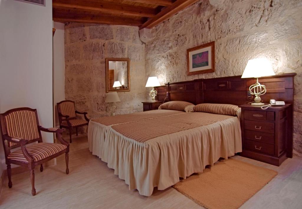 Cama o camas de una habitación en Señorio de Olmillos