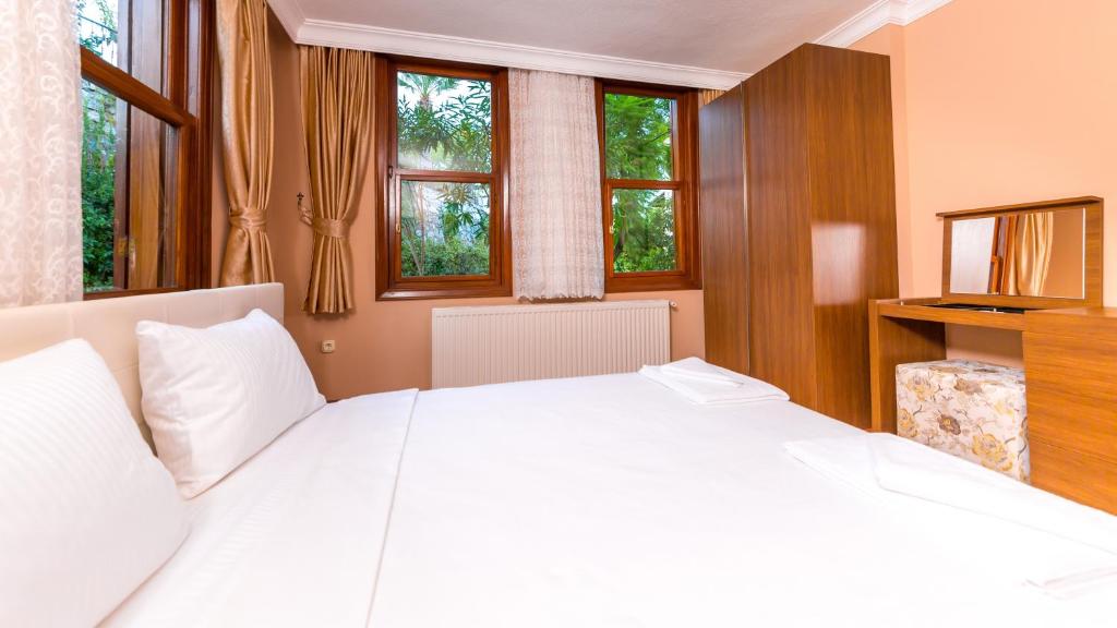 Postel nebo postele na pokoji v ubytování Marmaris Holiday Villas