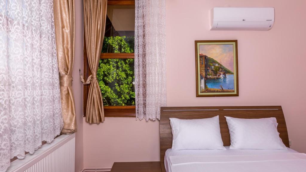 Postel nebo postele na pokoji v ubytování Marmaris Holiday Villas