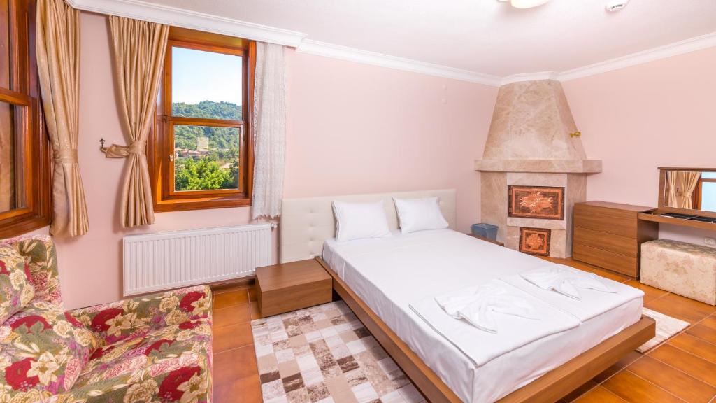 Postel nebo postele na pokoji v ubytování Marmaris Holiday Villas