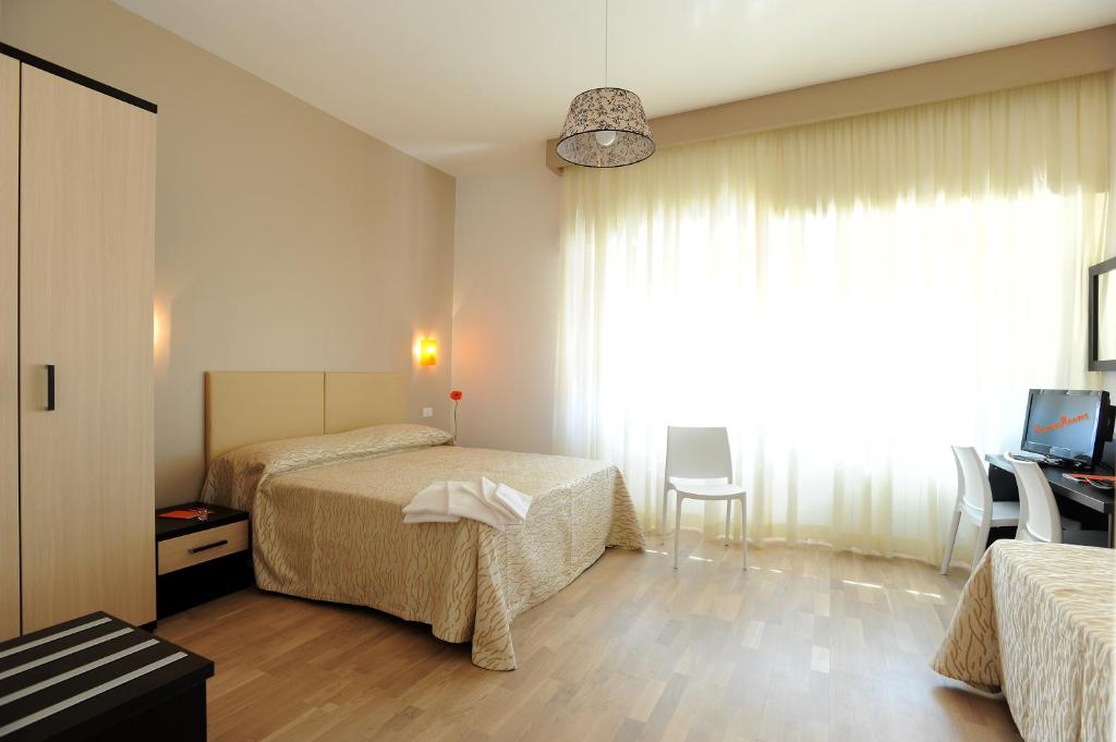 Posteľ alebo postele v izbe v ubytovaní Honey Rooms