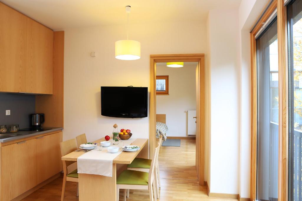 TV a/nebo společenská místnost v ubytování Apartments and Rooms Bernik