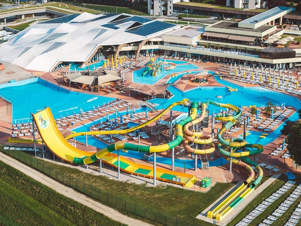a large water park with a bunch of water slides at Glamping Terme Tuhelj in Tuheljske Toplice