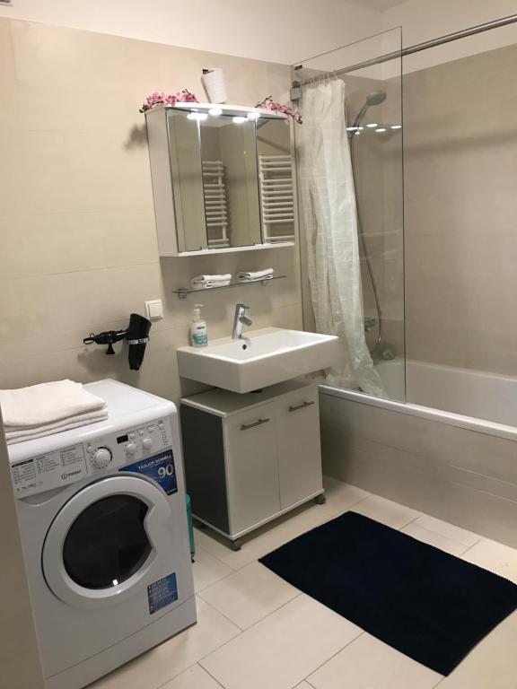 A bathroom at Apartment with parking on premise