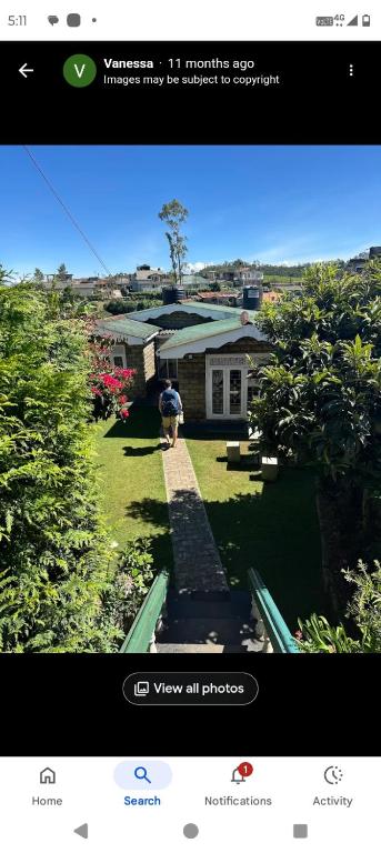 a screenshot of a video of a house at Aerizo Tours & bungalow in Nuwara Eliya