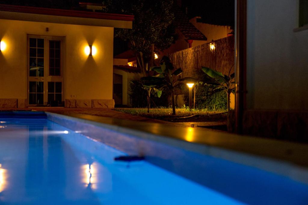 Bazén v ubytování Casa dei Carrubi nebo v jeho okolí