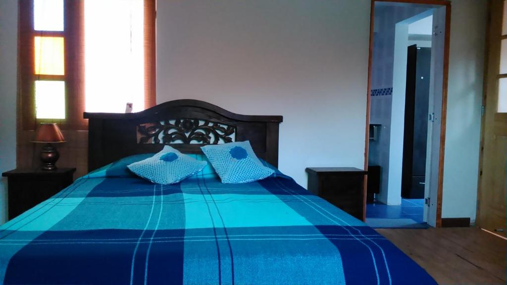 Postel nebo postele na pokoji v ubytování La Posada Pyg