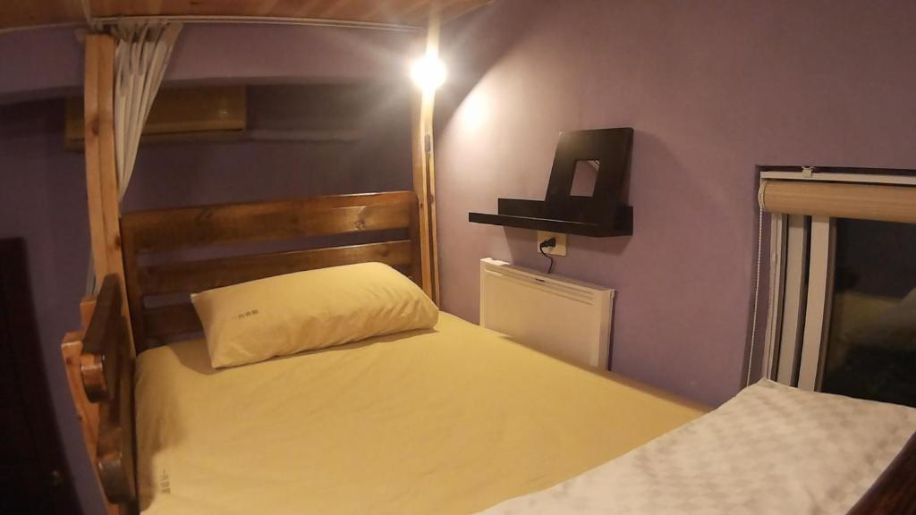 Postel nebo postele na pokoji v ubytování On Board Hostel
