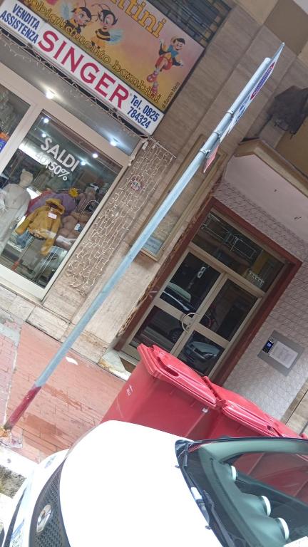 a fire truck parked in front of a store at la casa di Titty con wi fi in Avellino