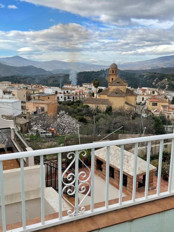 a view of a city from a balcony at Aires de la Alpujarra in Alcolea
