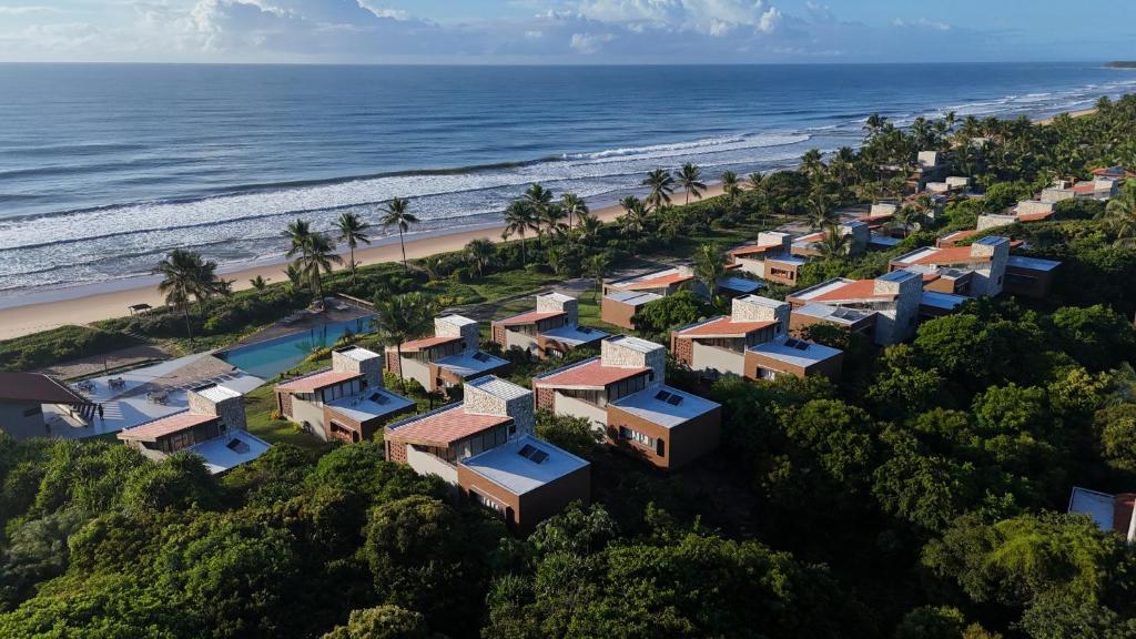 an aerial view of a resort on the beach at Alma Maraú - Praia do Cassange in Marau