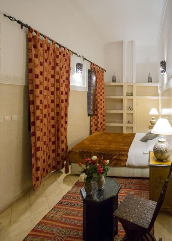 Postel nebo postele na pokoji v ubytování Riad Light Of Sun