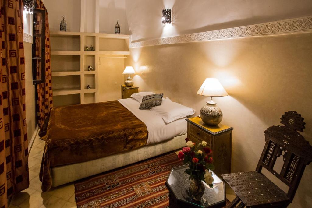 Postel nebo postele na pokoji v ubytování Riad Light Of Sun