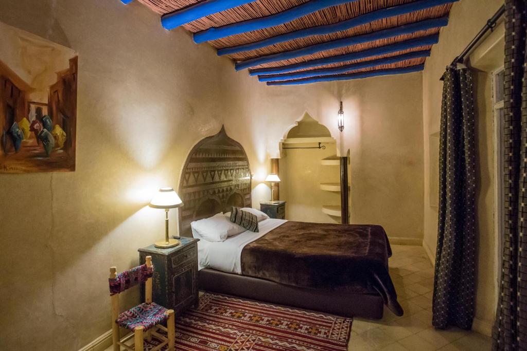 Postel nebo postele na pokoji v ubytování Riad Light Of Sun