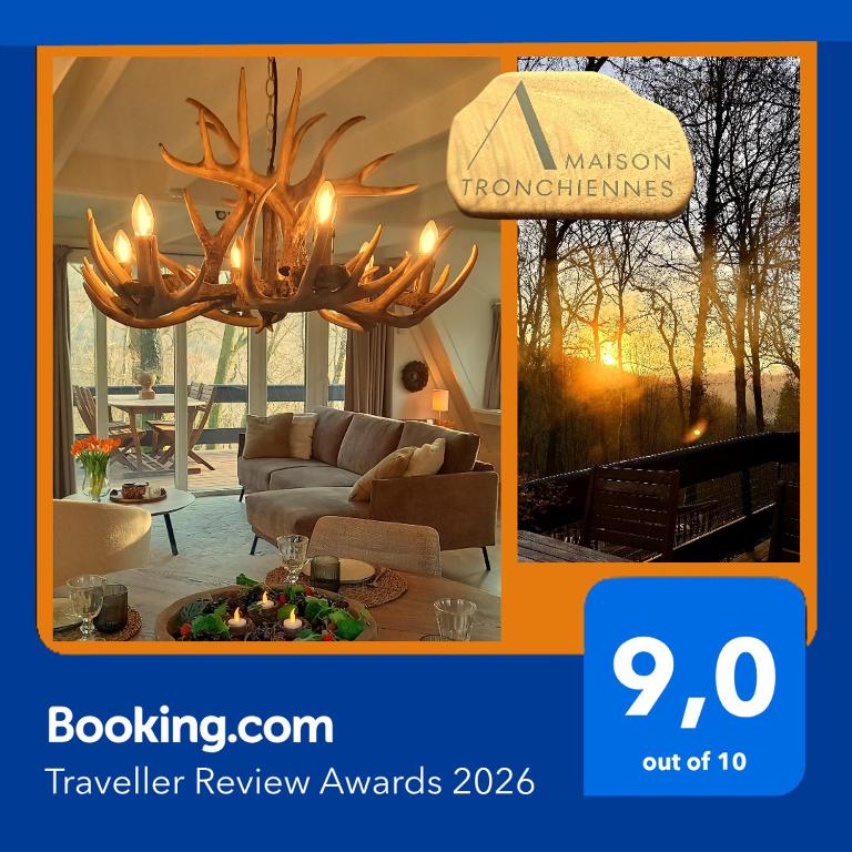 a picture of a living room with a large antler chandelier at Maison Tronchiennes in Durbuy