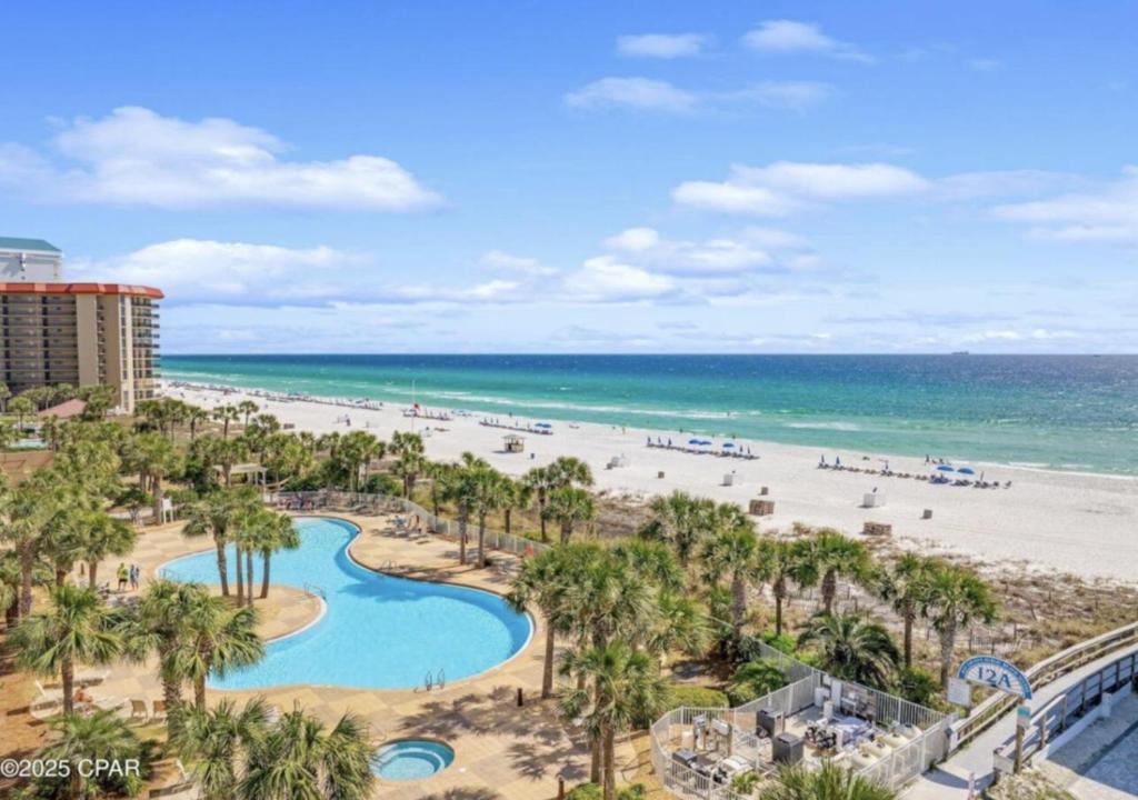 an aerial view of the beach at the resort at Gulf-Front Paradise, Steps to Beach & Pool Access in Panama City Beach