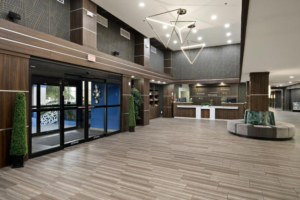 an empty lobby of a building with at Verta Hotel McAllen in McAllen