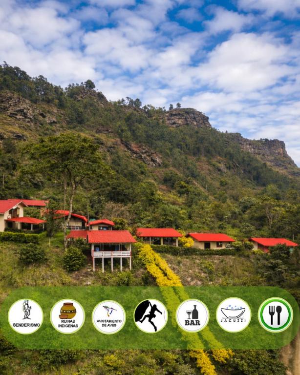 a group of frisbee signs in front of a mountain at Hotel Campestre Rocas Del Paraíso in Machetá