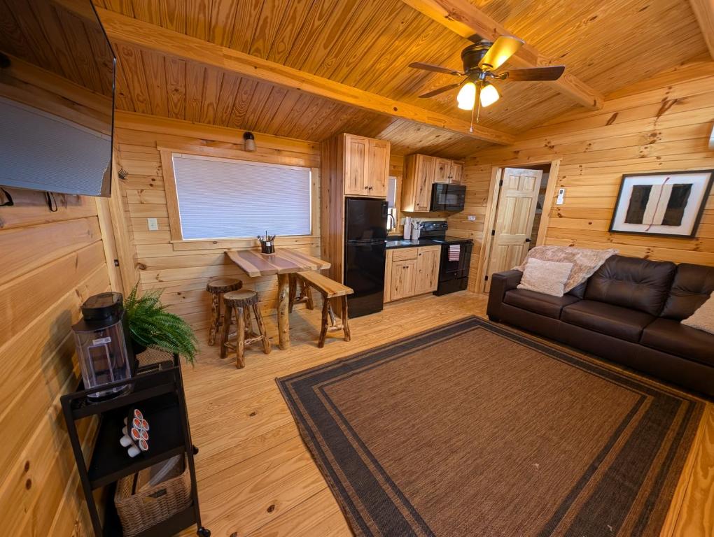 a living room with a couch and a table at Blue Buffalo Resort in Island Park