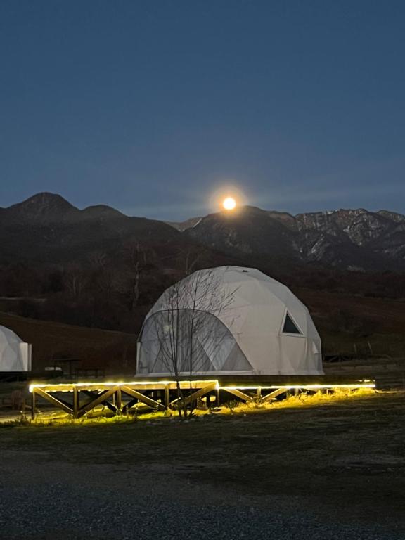 a white dome tent with the moon in the background at Chadir yurd glamp in İsmayıllı