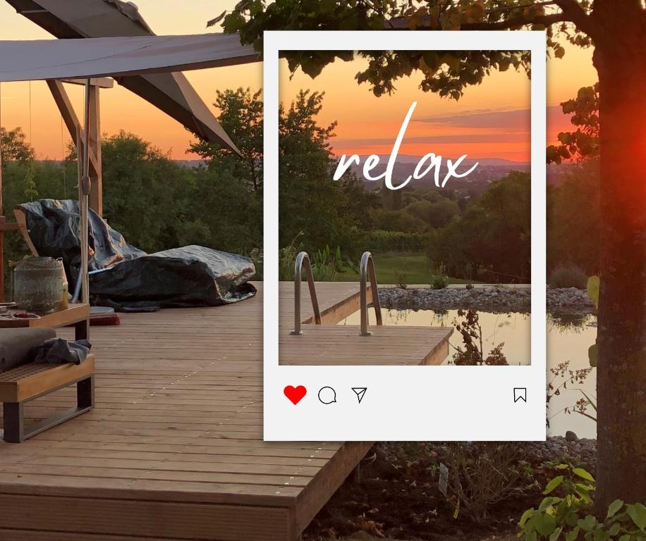 a picture of a dock with a sign that reads relax at The view - Helfenberg in Ilsfeld