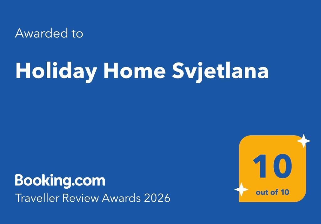 a sign that reads holiday home sylvania with a yellow box at Holiday Home Svjetlana in Risika