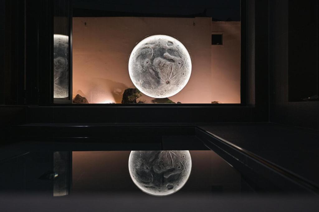 a view of two artifacts in a museum window at Stay Yeojin Yeomong in Gyeongju