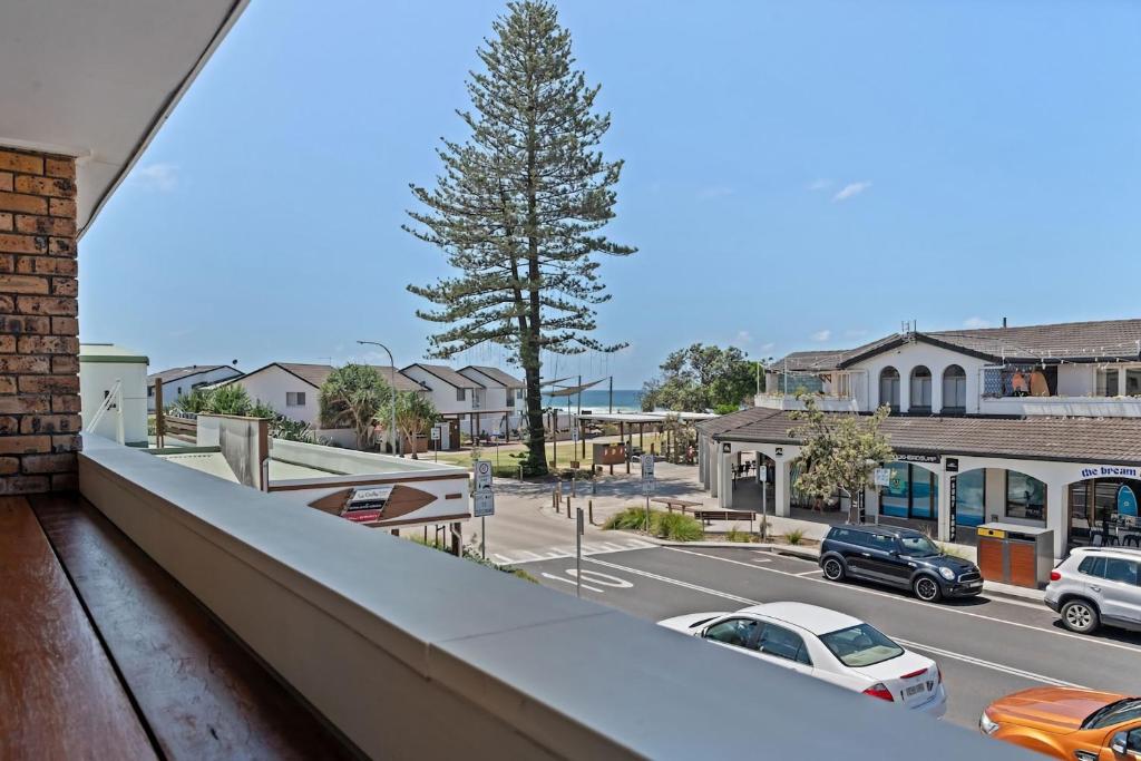 a view of a city street with cars on the road at Sun Soaked Lennox Village in Lennox Head