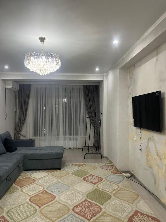 Televisor o centre d'entreteniment de Квартира